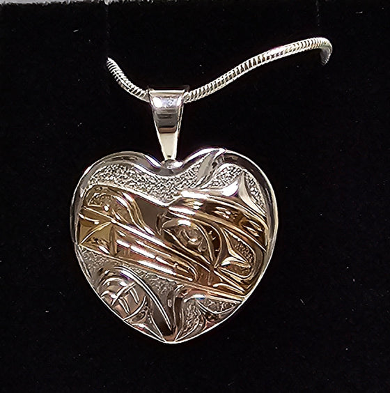 Heart shape Pendant with bear design silver/gold by Joe Descoteax