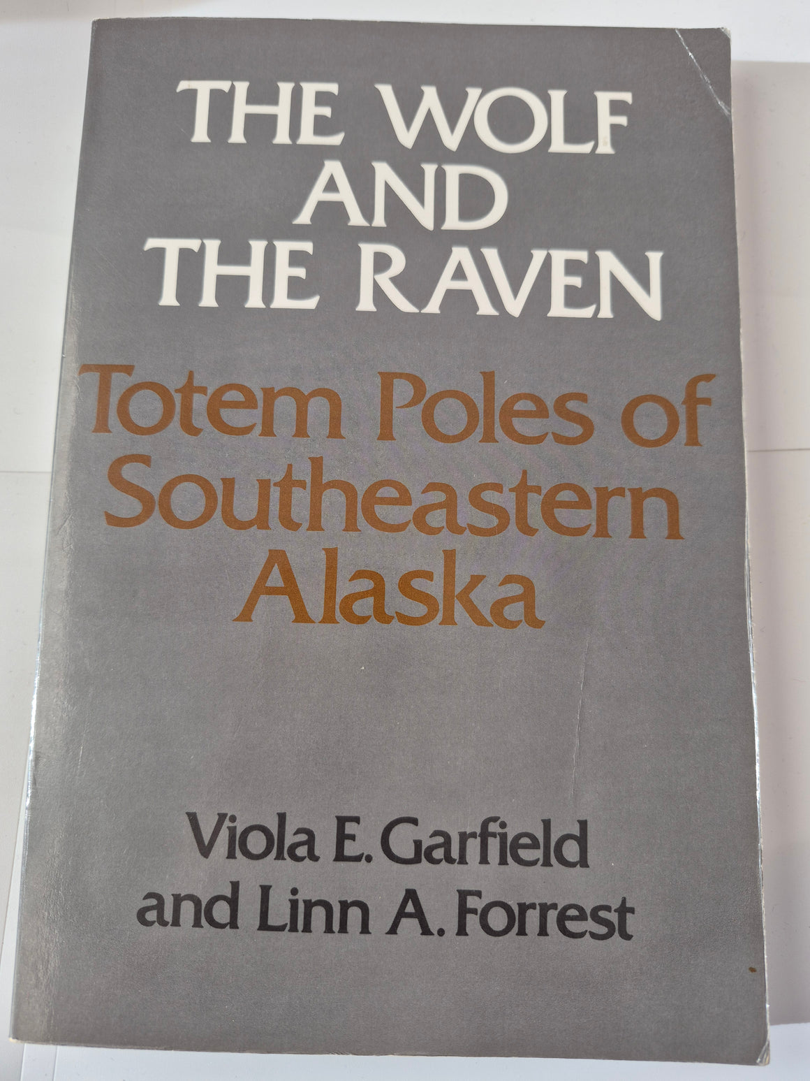 The Wolf and the Raven: Totem Poles of Southeastern Alaska" by Viola E. Garfield and Linn A. Forrest.