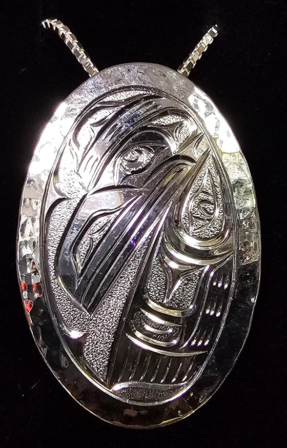 Raven Oval Silver Pendant by Joe Descoteaux