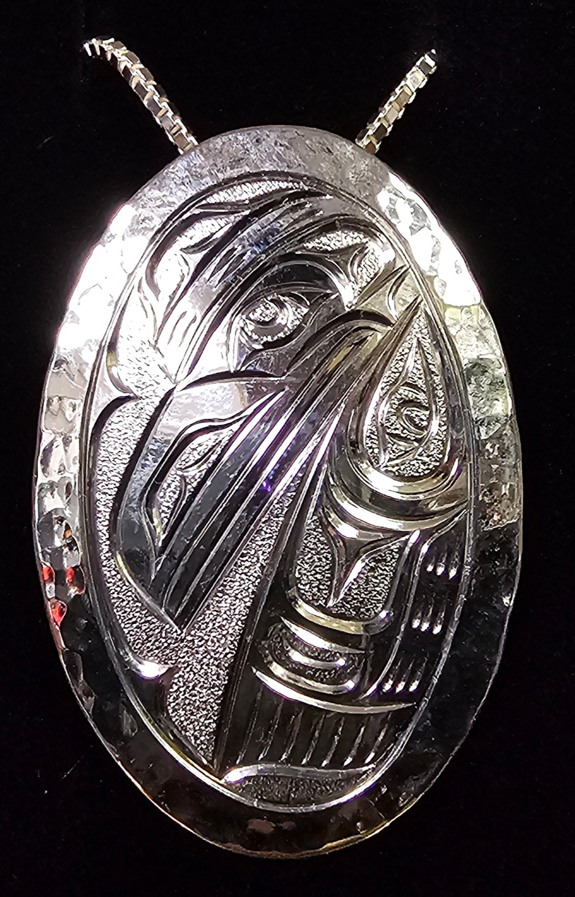 Raven Oval Silver Pendant by Joe Descoteaux